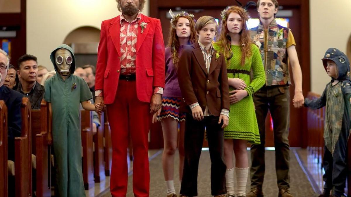 Shree Crooks, standing from left, Viggo Mortensen, Samantha Isler, Nicholas Hamilton, Annalise Basso, George MacKay and Charlie Shotwell appear in “Captain Fantastic.”