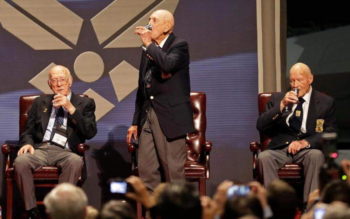 
Richard Cole, center, enjoys a toast with two other surviving members of the 1942 Tokyo raid led by Lt. Col. Jimmy Doolittle – Edward Saylor, left, and David Thatcher – in 2013 at the National Museum of the U.S. Air Force in Dayton, Ohio.


