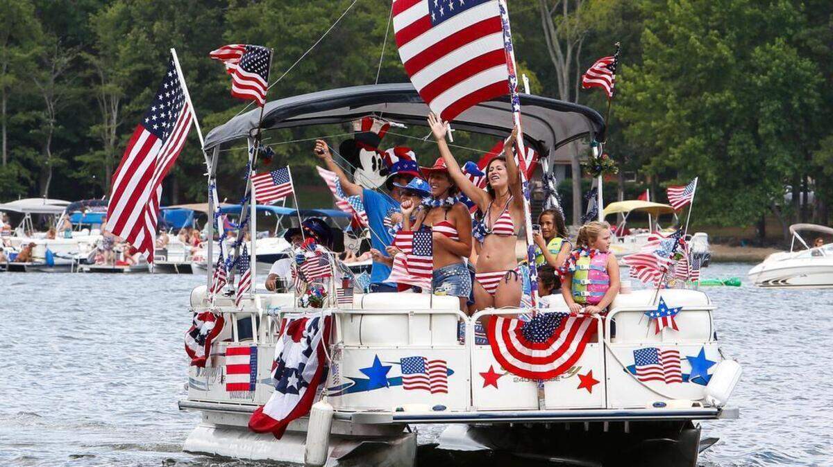 Grand Prize winning and returning entry to the Lake Wylie boat parade is the Romance family. Representing 4 generations of proud Americans. The main flag was presented to them with the parting of Great Grandpa Jimmy who served in WWII.