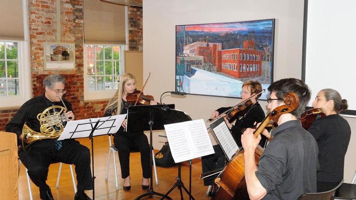 Musicians, from left, Christopher George, Sarah Land, Elda Franklin, Essena Setaro and Ryan Knott from the newly formed Rock Hill Symphony Orchestra perform May 10 during a preview gala for early supporters and sponsors at Williams & Fudge.