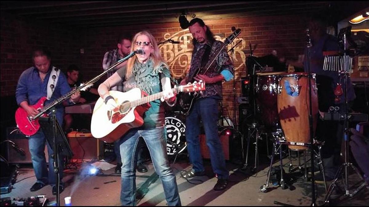 Raine performing live Friday at Eaglespeak Coffee House in south Charlotte is all about combined power and the musical impact.