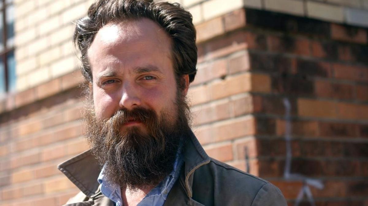 Sam Beam, of Iron & Wine, during the 2013 SXSW Music Festival in Austin, Texas. Beam has returned both to the Sub Pop label where his career started and the warm, acoustic sound of his early material. His sixth album "Beast Epic" comes out Friday.