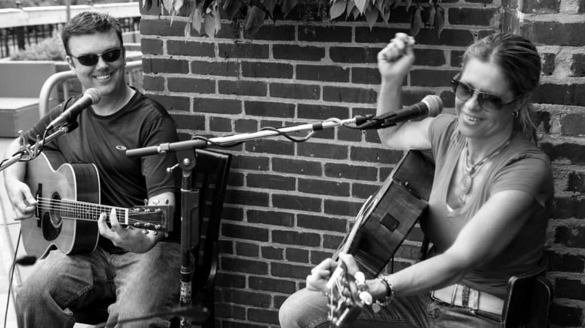 LS Brown, left, and Christina Raine bring Square Roots Music to The Brass Tap Friday at Riverwalk in Rock Hill.