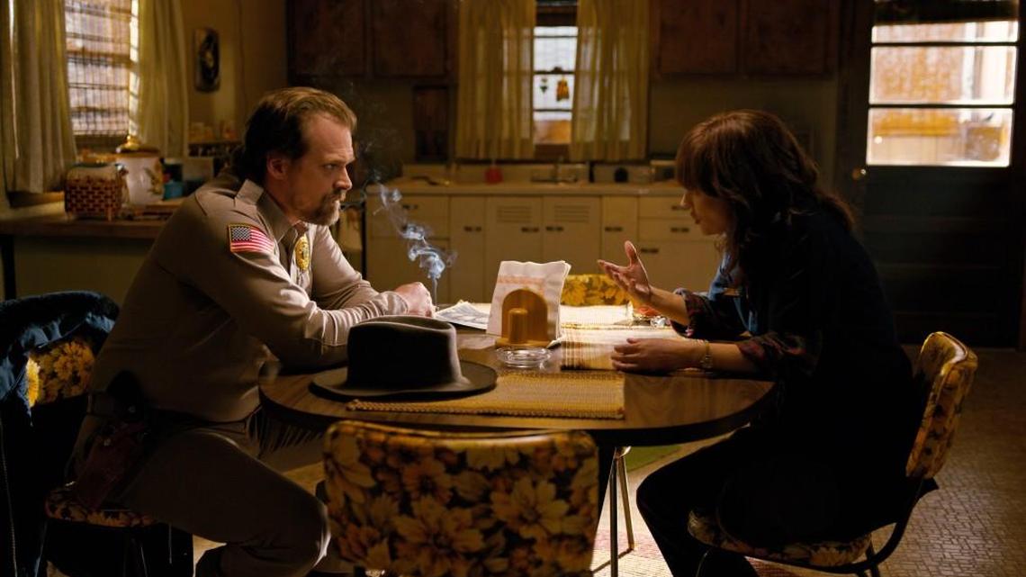 David Harbour, left, and Winona Ryder in a scene from Season 1 of “Stranger Things."