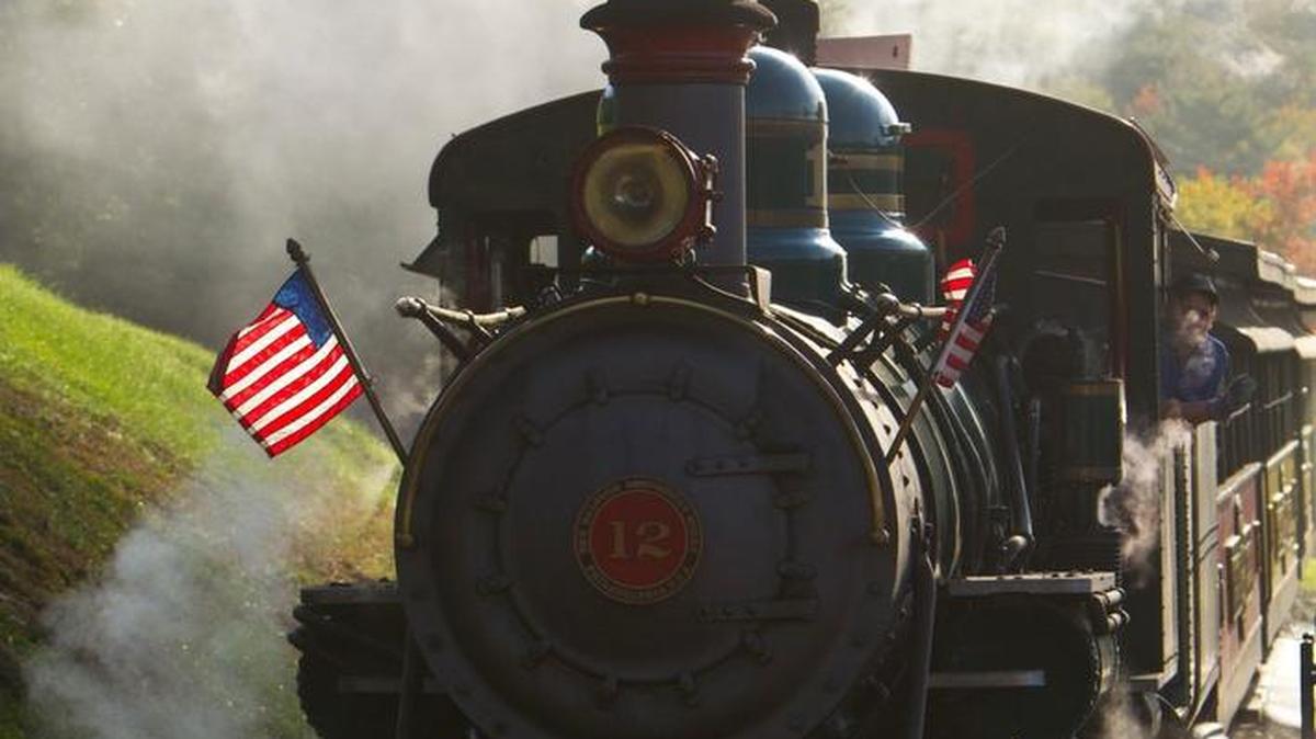 Engineer Shane Shief guides the Number 12 steam engine along at the Tweetsie Railroad in Blowing Rock, N.C.