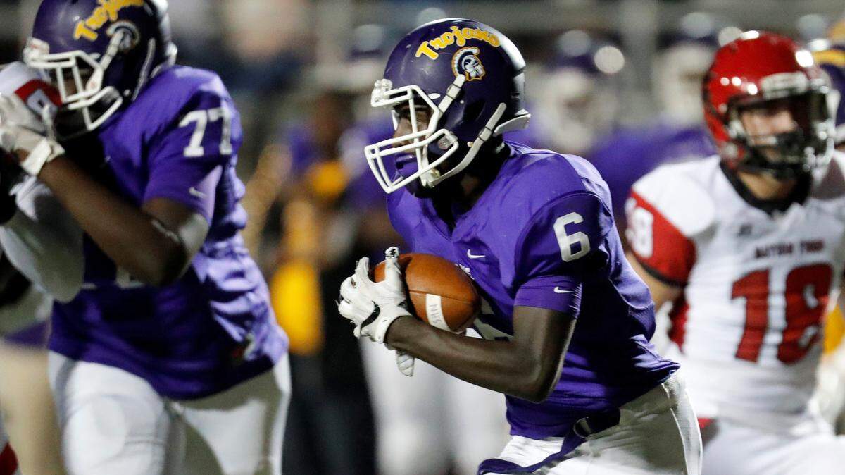 Northwestern’s #6 Antonio Heath carries the ball as Northwestern defeats Nation Ford in a second half nail biter, Friday 10-12-2018.