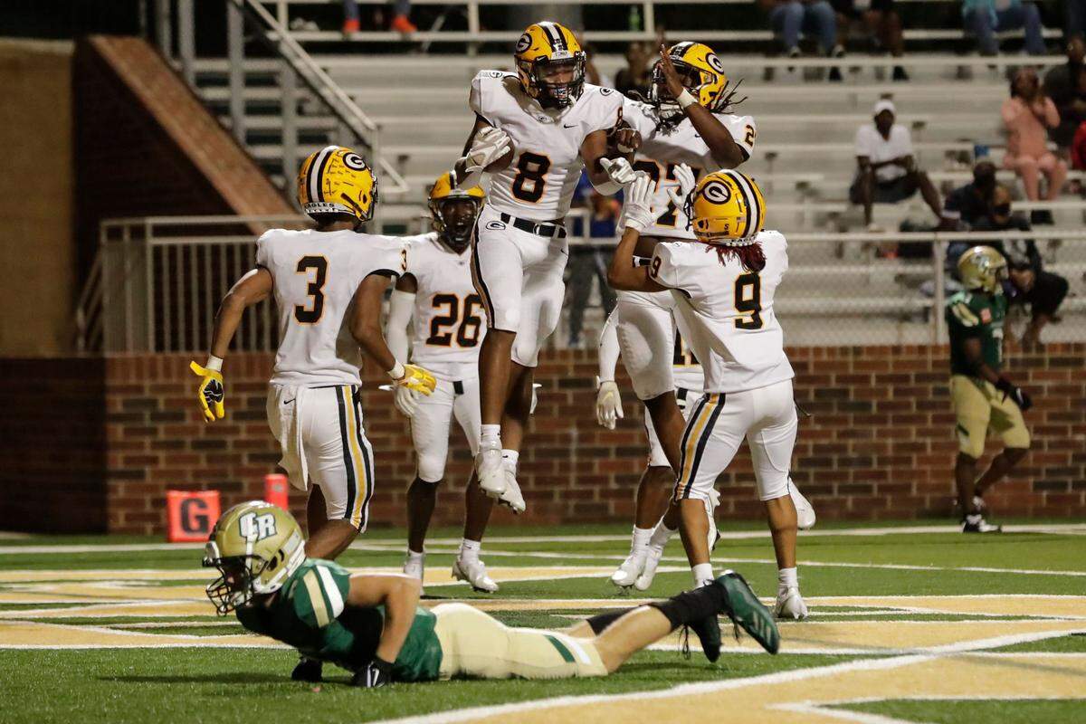 Greenwood players celebrating a touchdown against Catawba Ridge on Friday, Sept. 3, 2021.