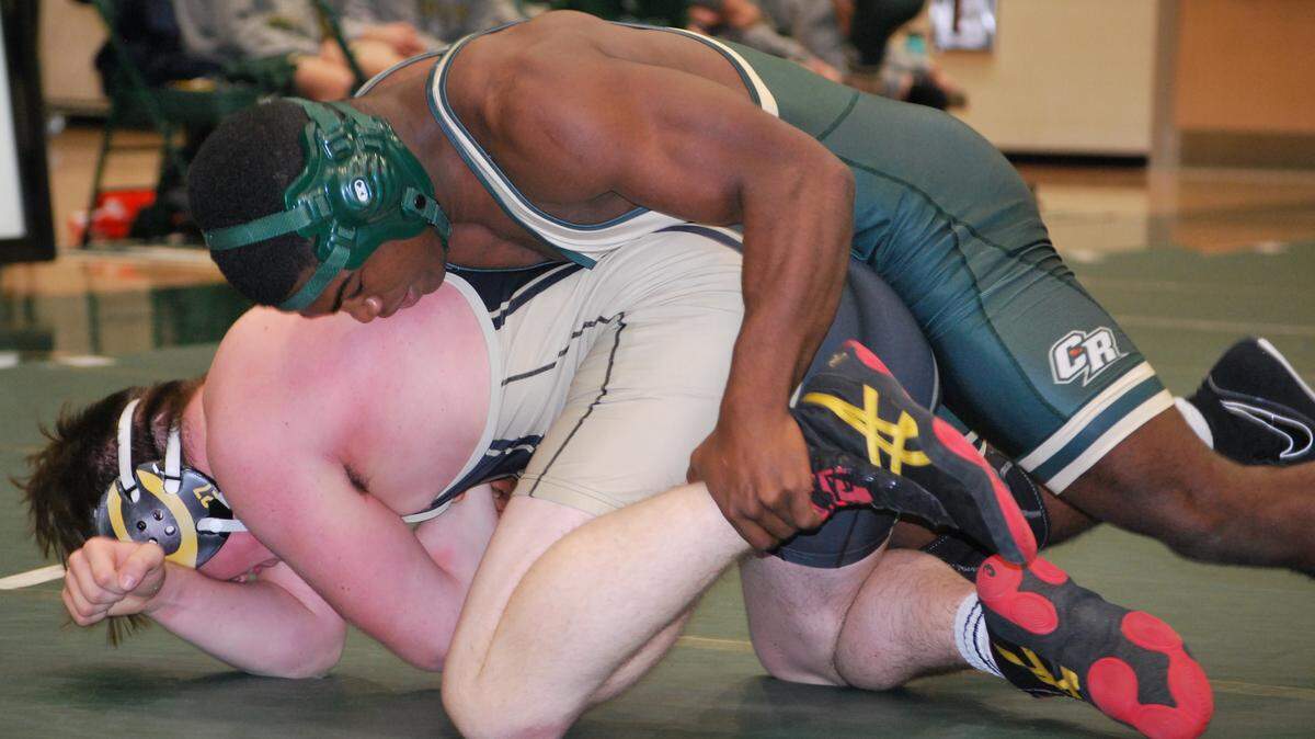 Catawba Ridge’s RJ Lincoln, top, wrestles Gavin McMann from Camden. Lincoln has been a bright spot in the Copperheads’ lineup this season.
