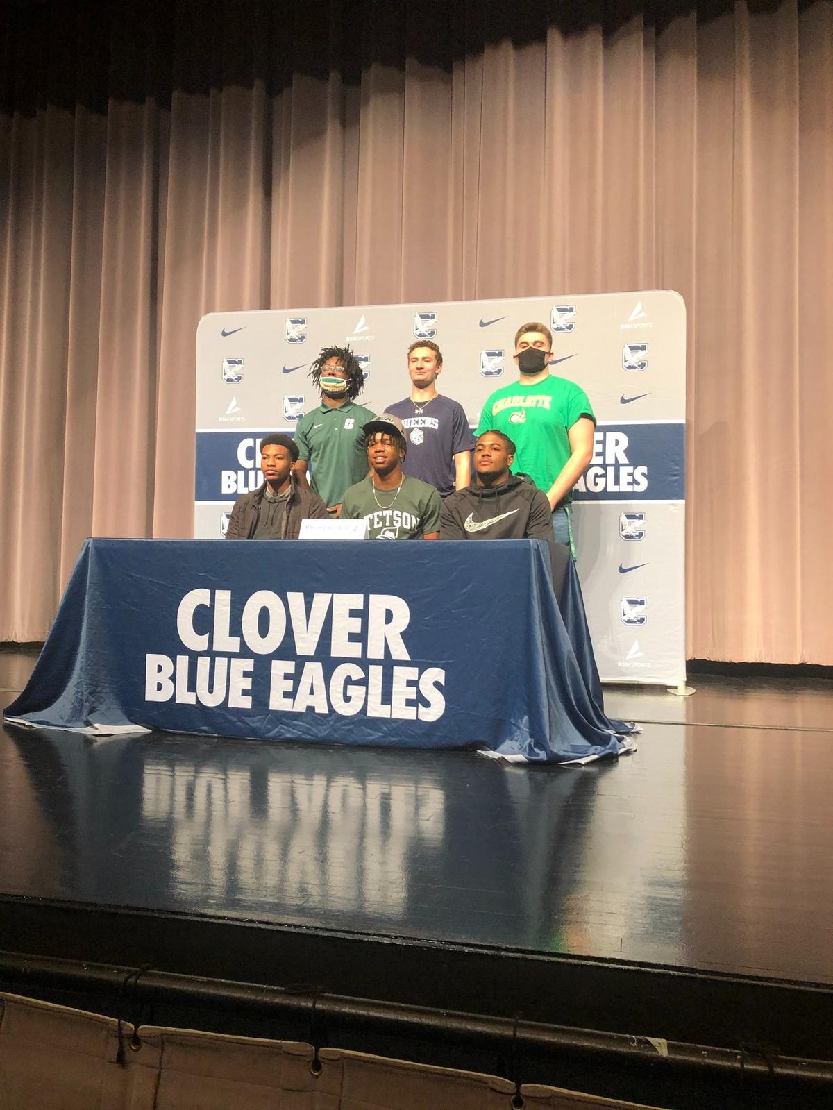 The Clover football seniors gather for a picture on National Signing Day.