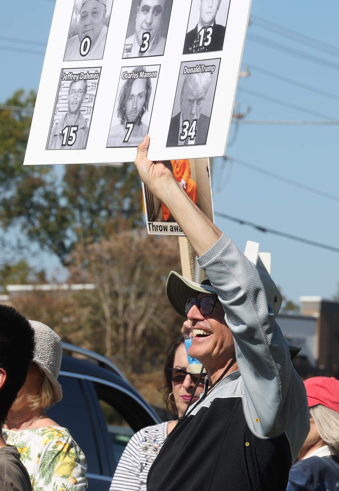 A protester holds up a sign at the “No Kings” rally that was held across the street from Indian Land Middle School on Saturday, Oct. 18. Residents from Indian Land and Fort Mill gathered in conjunction with the national protests.