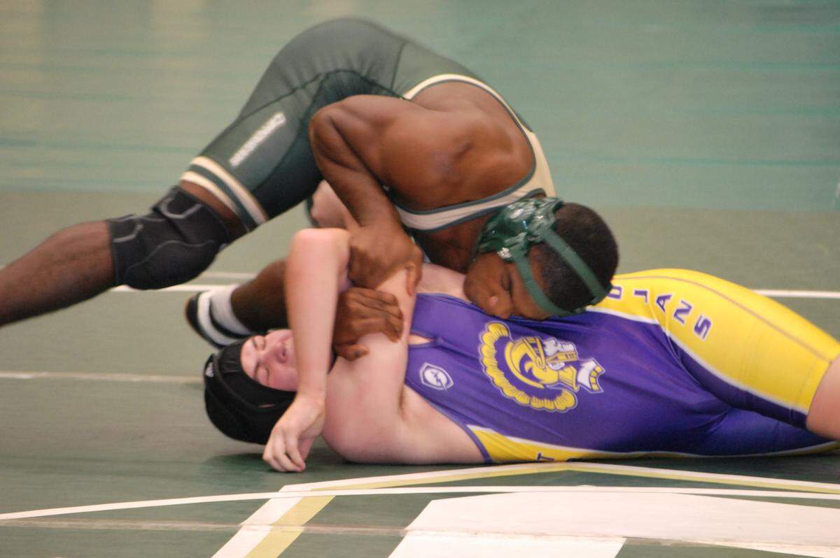 Catawba Ridge’s RJ Lincoln, top, graduates as the wins and pins leader in Copperhead history.