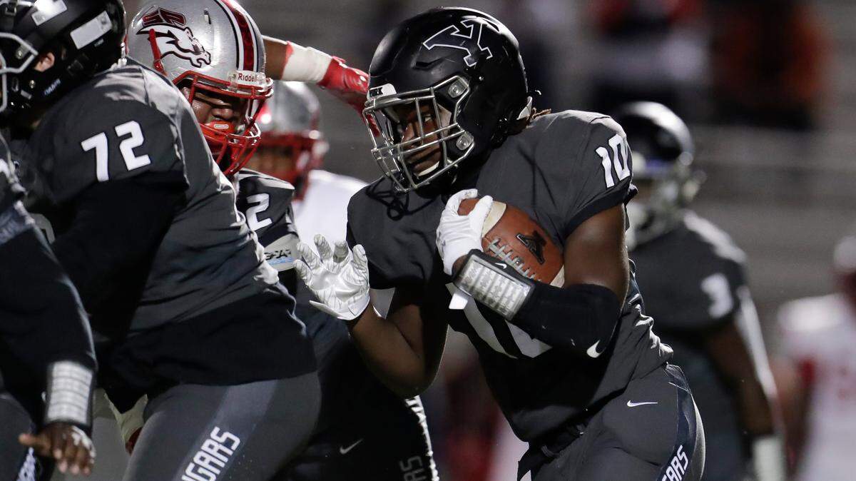 Herald file: York’s #10 RJ Glasgow carries the ball in first half play as the York Cougars host the South Point Stallions in conference play 10-23-2020. Glasgow will be a key returner for the Cougars in 2021.