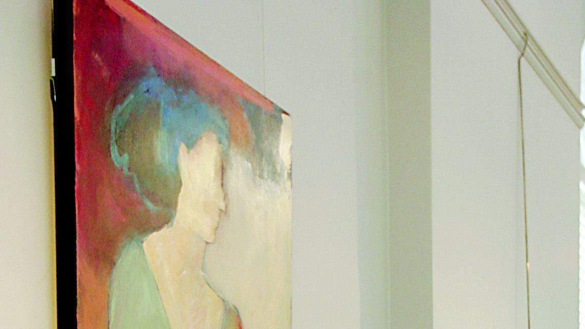 Harriet Goode poses in the hall gallery of her downtown Rock Hill penthouse. The prominent Rock Hill artist is being recognized with an exhibit at the Center for the Arts, "Sister Marshall: Works by Harriet Goode, 1955 to 2007," that features about 30 works, spanning the years since she was a Converse College freshman. The charcoal drawing of a Michaelangelo plaster cast, above right, was drawn by Goode in 1955. The center work is "Sisters of Another Century," a watercolor from 1984, while the bottom work is a 2007 piece titled "The Air She Breathed was Bent, Twisted."