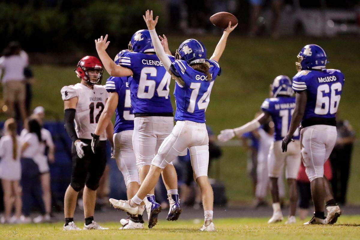 Herald file: Indian Land quarterback (14) Blake Goode celebrates the win as Indian Land hosts Nation Ford on Aug. 20. The Warriors also played in a big game Friday, Sept. 10.