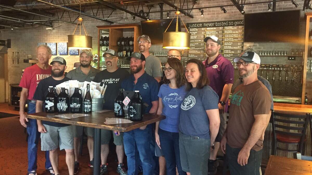 In this file photo, representatives from local breweries gathered at Legal Remedy Brewing for the announcement of the new “YoCo Brew Trail.”