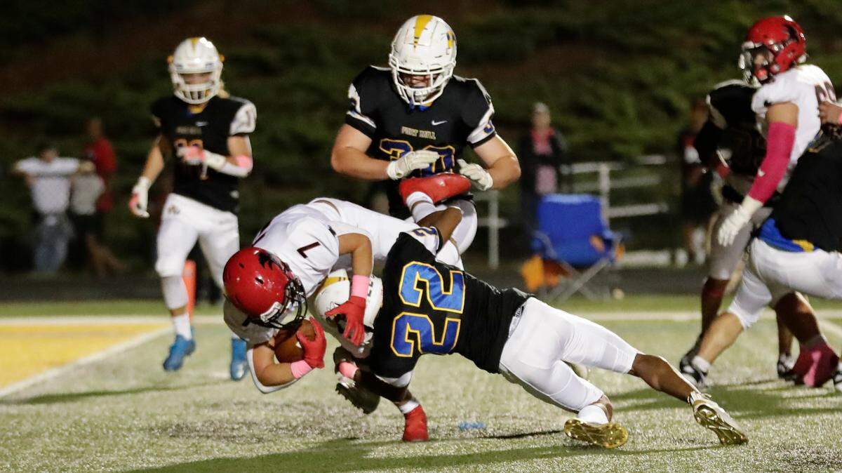 Nation Ford’s (7) Will Alvarado scores a touchdown in first quarter play as Fort Mill hosts Nation Ford in a cross town football rivalry Friday, October 1, 2021.