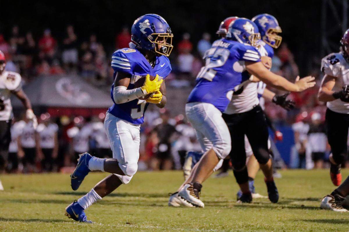 Indian Land’s (3) Sean McCray carries the ball in second half play as Indian Land hosts Nation Ford in Friday night football action. 8-20-2021. Indian Land faces region foe York on Friday, Oct. 3.