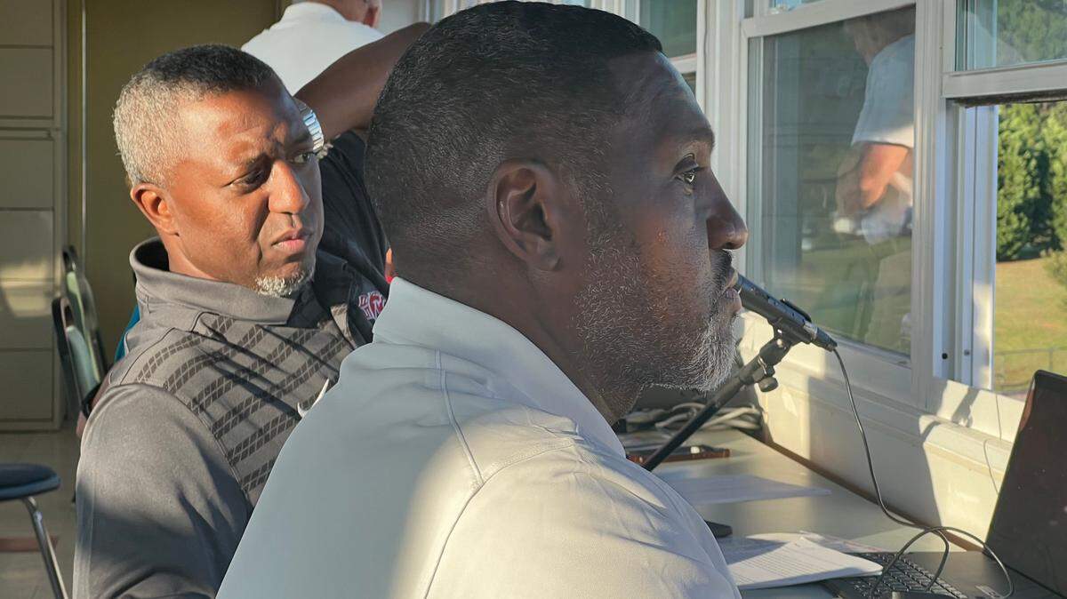 William “Bump” Roddey speaks with spotter William McCrorey ahead of South Pointe’s season opener against Spartanburg.