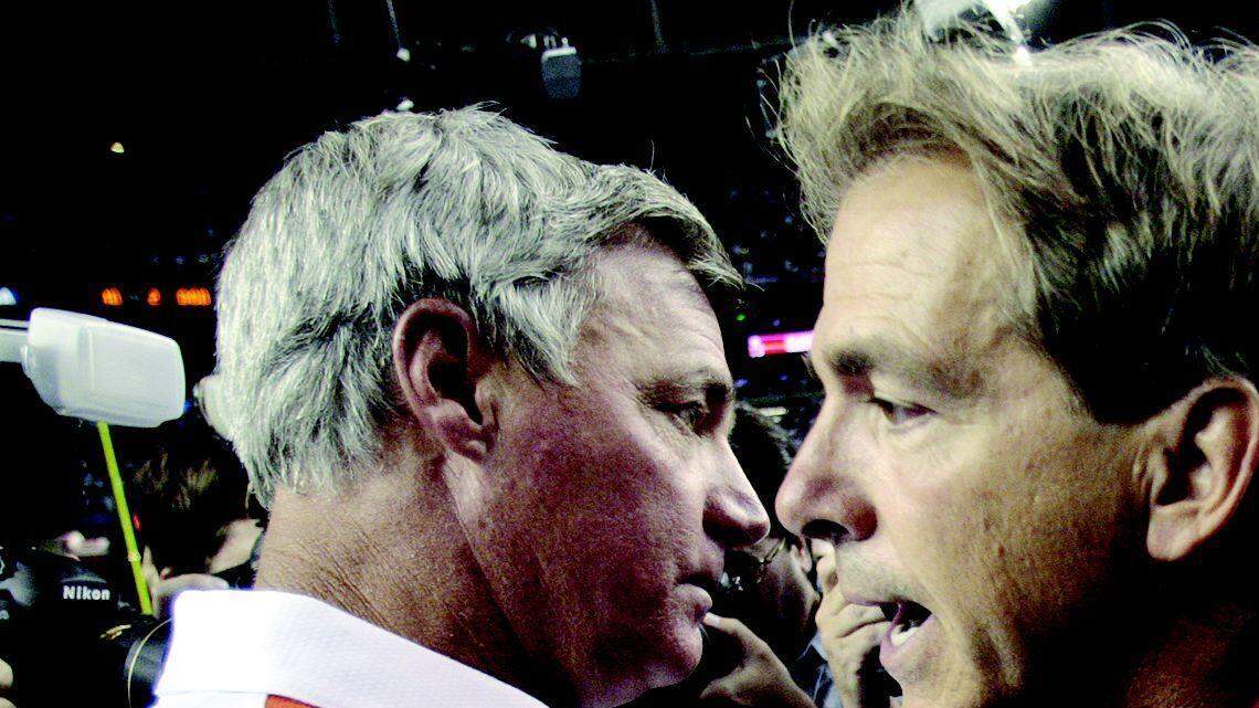 Clemson coach Tommy Bowden, left, congratulates Alabama coach Nick Saban after No. 24 Alabama beat No. 9 Clemson.