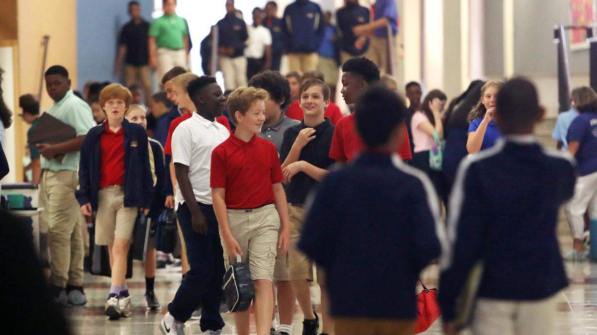 In this file photo, Saluda Trail Middle School students walk through the hall during a S.T.E.A.M. event.