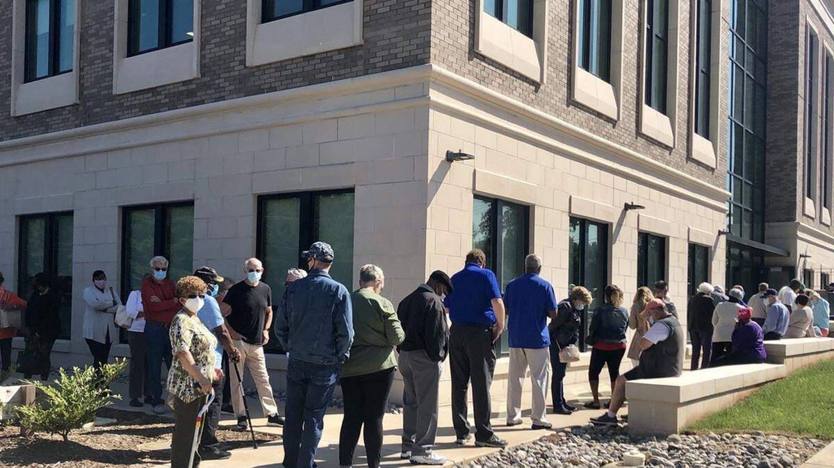 Hundreds wait in line to cast an absentee in-person ballot at the York County SC elections office.