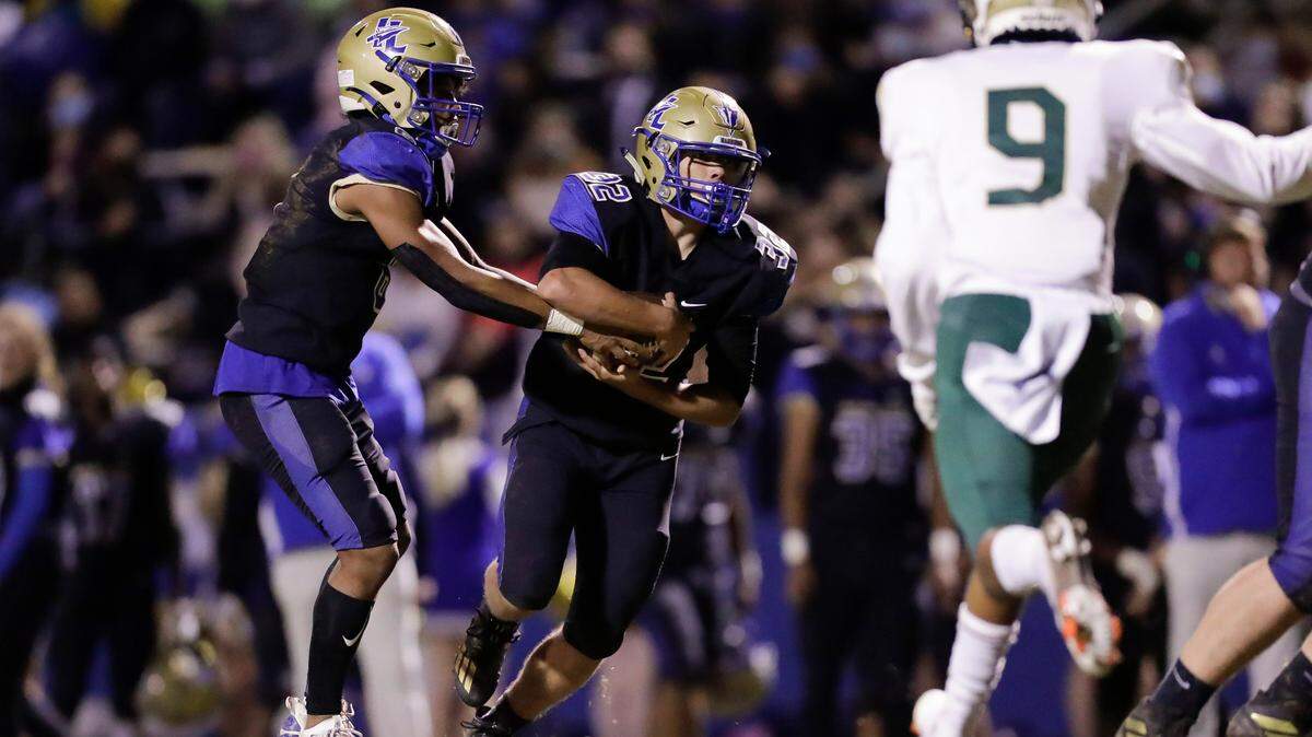 Herald file 2020: Indian Land’s #32 Jaden Singletary, who’s expected to be an important part of the Warrior offense in 2021, takes the hand off as Indian Land hosts Catawba Ridge in Friday night varsity football. 10-16-2020.