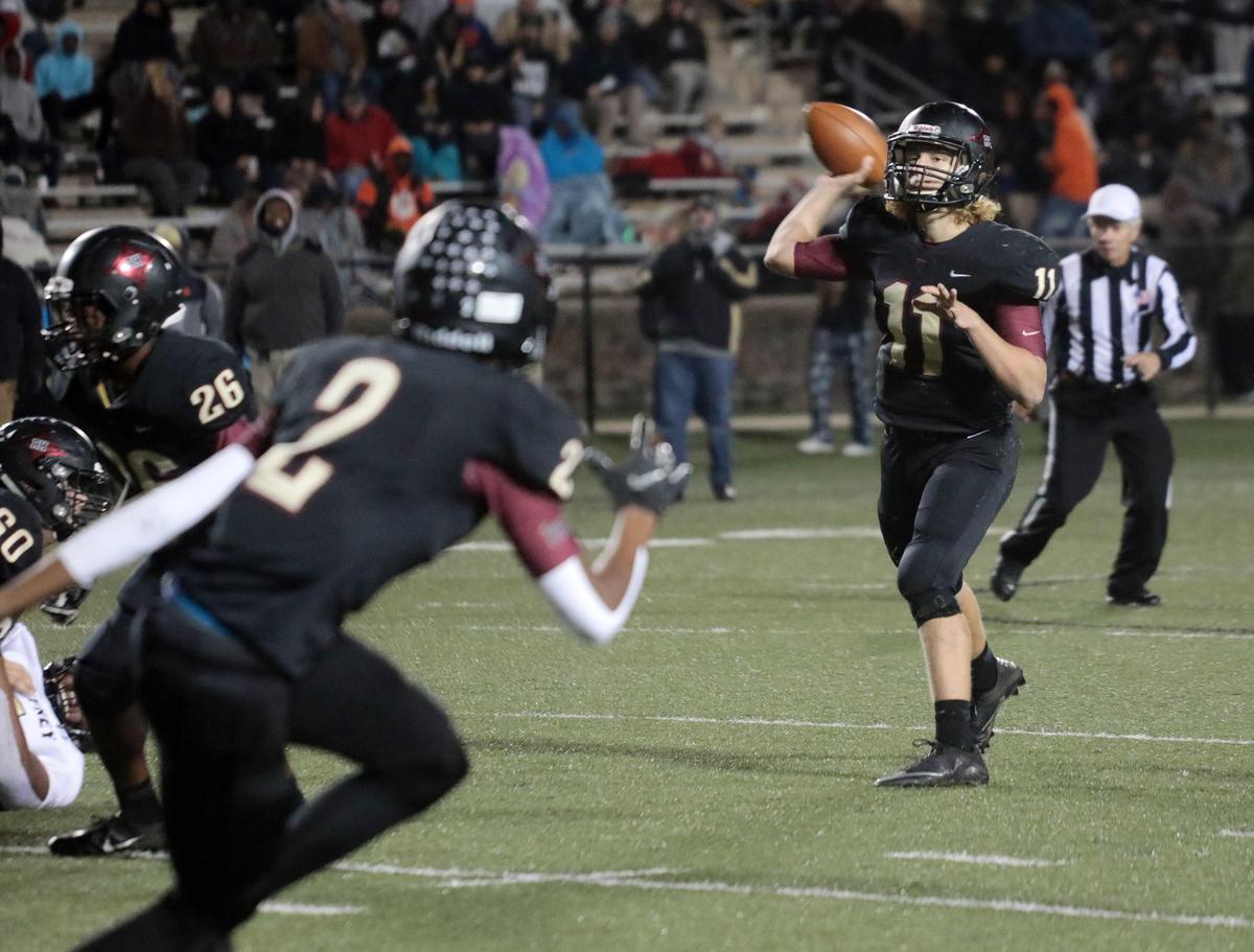 Rock Hill quarterback Jackson Roberson looks for an opening.