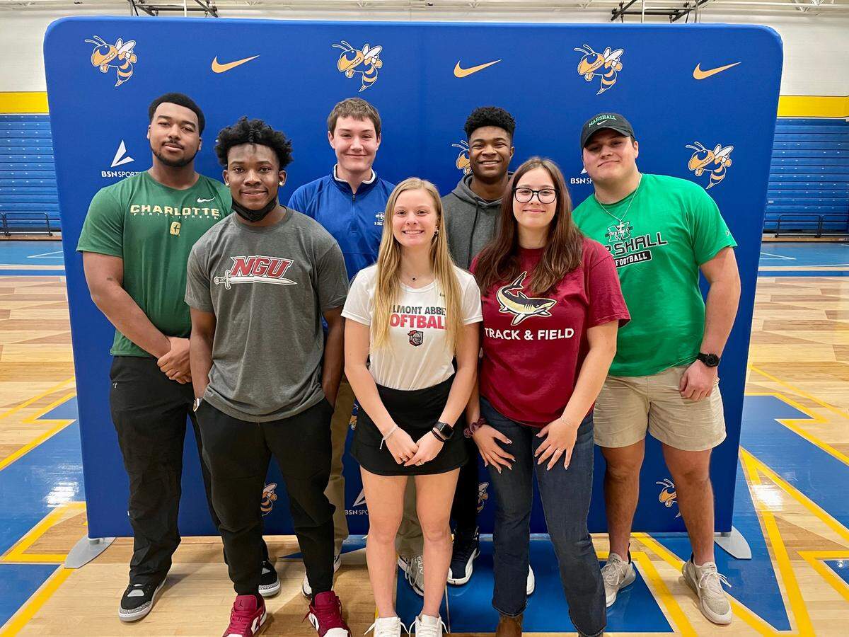 Fort Mill celebrated seven soon-to-be college athletes on Wednesday. Back row from left to right: Marcus Boston Brinkley, Luke Garabedian, Michael Threatt, Charlie Veltri. Front row from left to right: JJ Ogwal, Trinity Wall, Sophia Stalford.