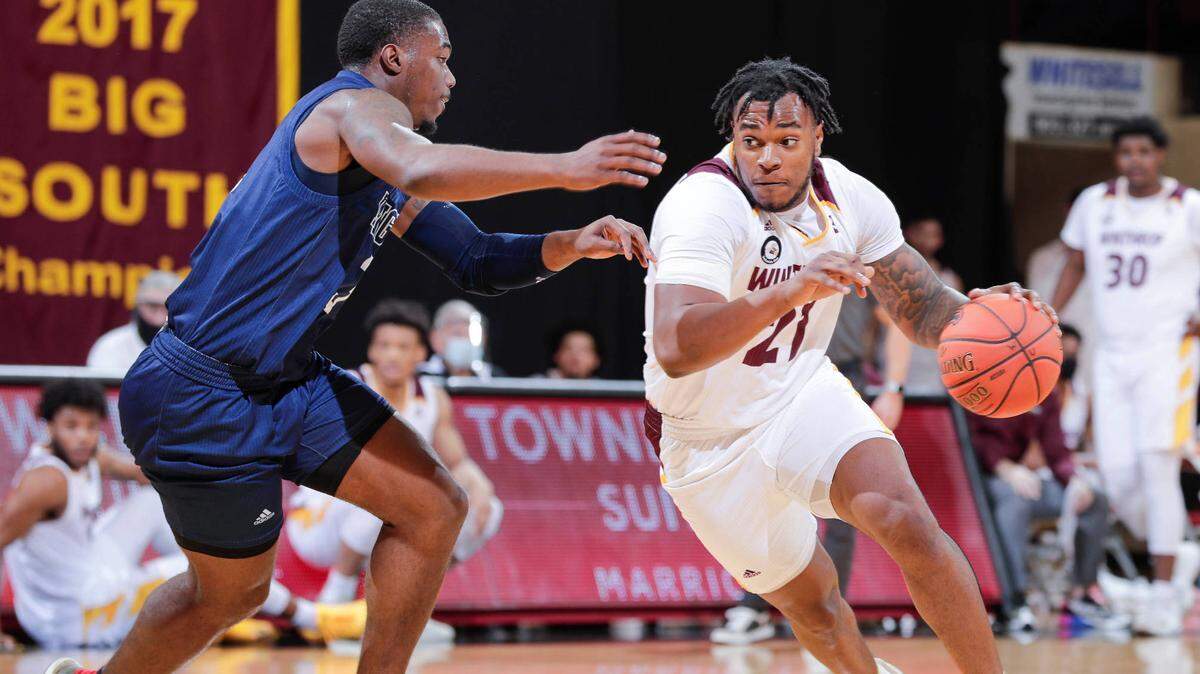 Winthrop’s #21 Jamal King drives towards the basket as Winthrop takes on Longwood in Big South conference men’s basketball at Winthrop Coliseum on Thursday, January 14, 2021 in Rock Hill, South Carolina.