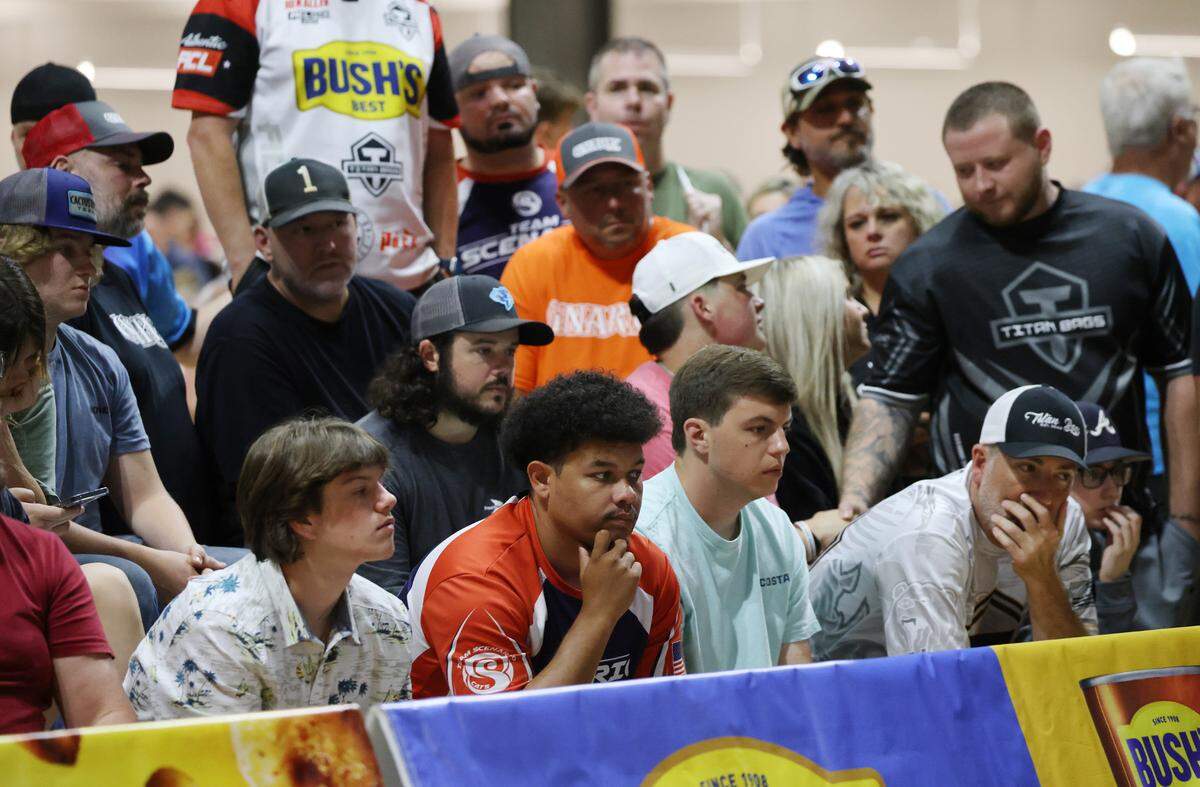Cornhole enthusiasts watch a game Friday at the American Cornhole League World Championships.