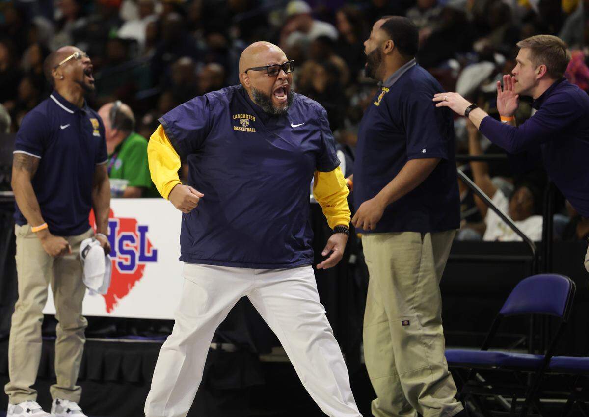 Lancaster head coach Jerron Cauthen celebrates as his team leads in the Class 4A state championship game Friday in Florence