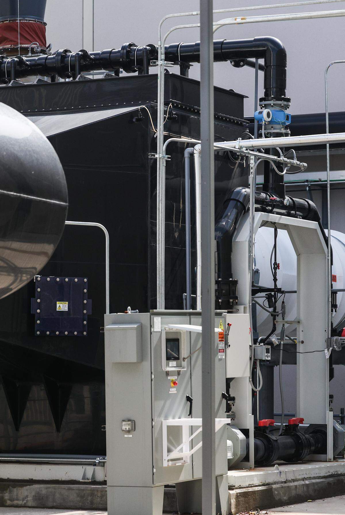 On Tuesday, a wet essex scrubber, the black structure, accidentally released 300 gallons of water containing small amount of potassium hydroxide at Silfab Solar in Fort Mill. 