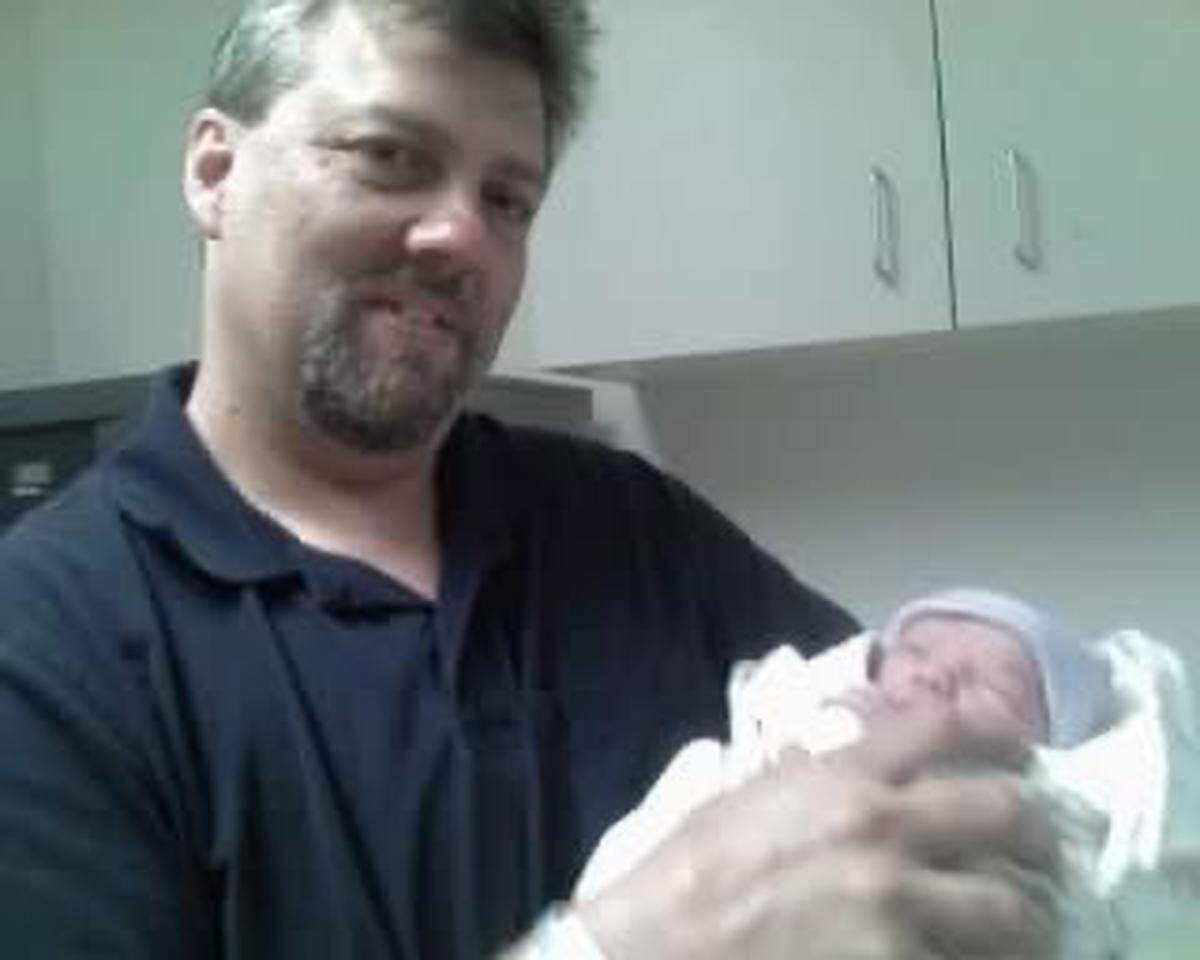 Ed&nbsp;Bengivenga with son. 