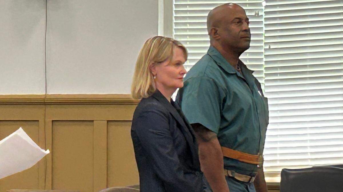 Former Chester County Sheriff Alex Underwood stands with his attorney in court Wednesday as South Carolina prosecutor Creighton Waters speaks. Underwood pleaded guilty to a collection of state charges, but won’t get any additional prison time. He’ll serve out the rest of a federal sentence in Kentucky.