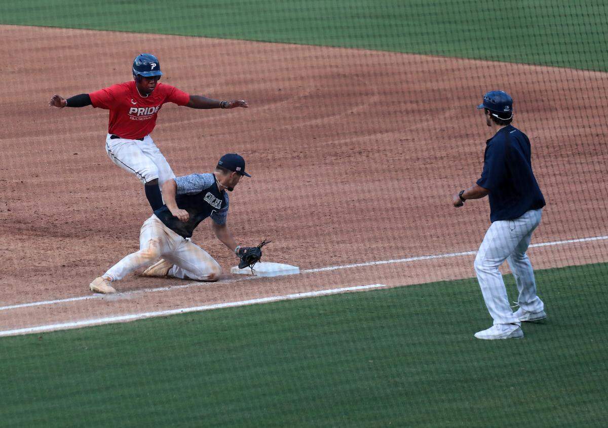 The Piedmont Pride baseball team, based in Rock Hill, competes with a team from Columbia on Saturday, July 25, at Truist Field in Charlotte, NC.