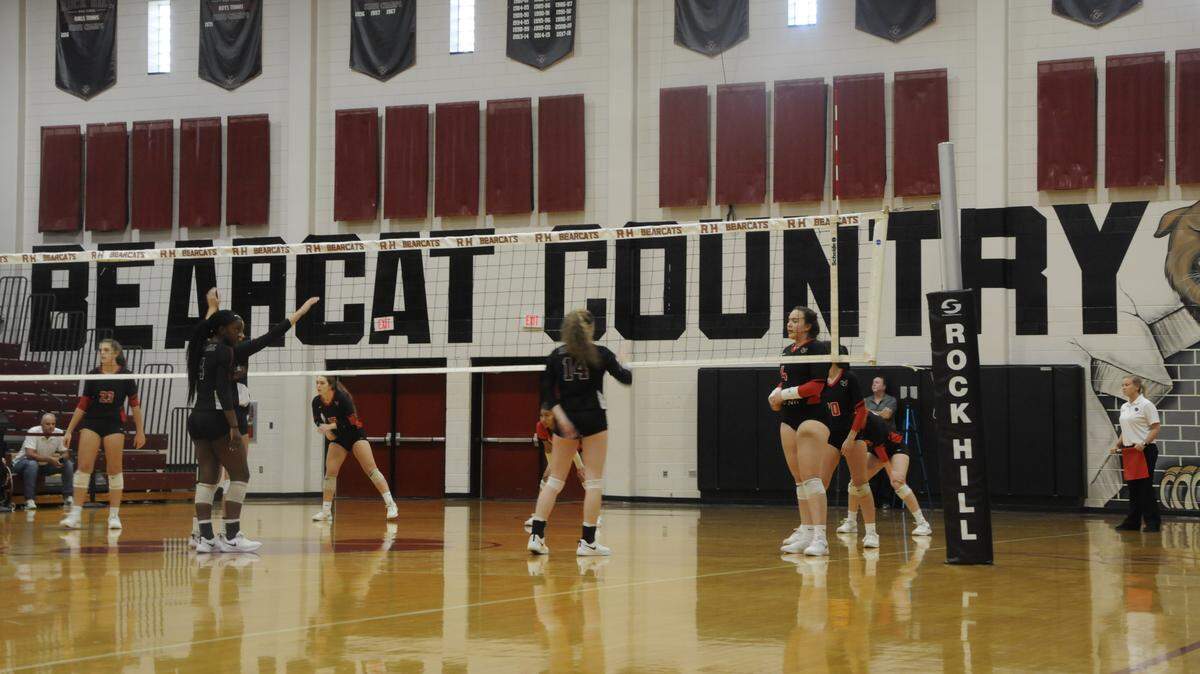 The Rock Hill High School volleyball team waits to return a serve in the first round of the state playoffs on Oct. 24, 2019.