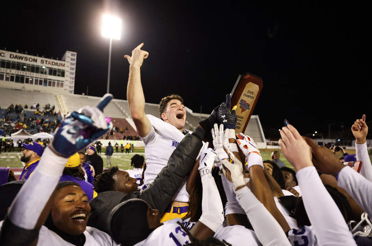 Finley Polk (10) of Northwestern celebrates with teammates following their win over Irmo in the Class 5A-D2 football state championship game at Oliver Dawson Stadium in Orangeburg on Saturday, December 14, 2024.