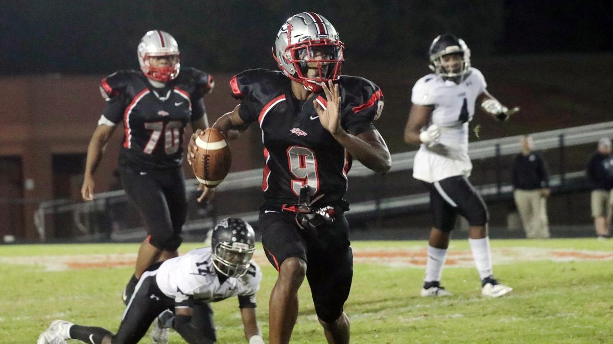 South Pointe’s O’mega Blake carries the ball on Friday, Nov. 1. The South Pointe Stallions competed against the York Cougars in varsity football.