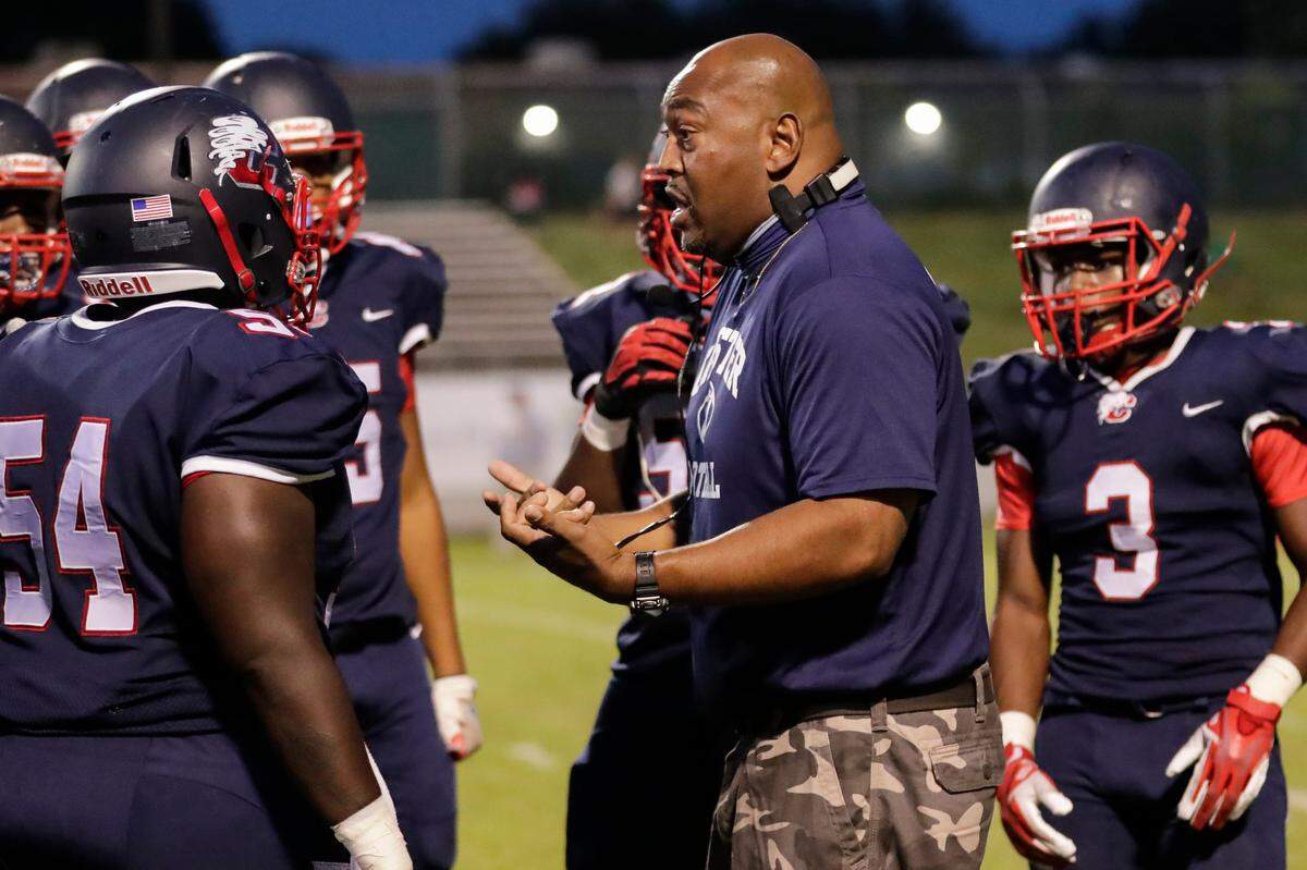 Chester head coach Victor Floyd motivates his team during a timeout as Chester hosted Northwestern on Sept. 10, 2021. 