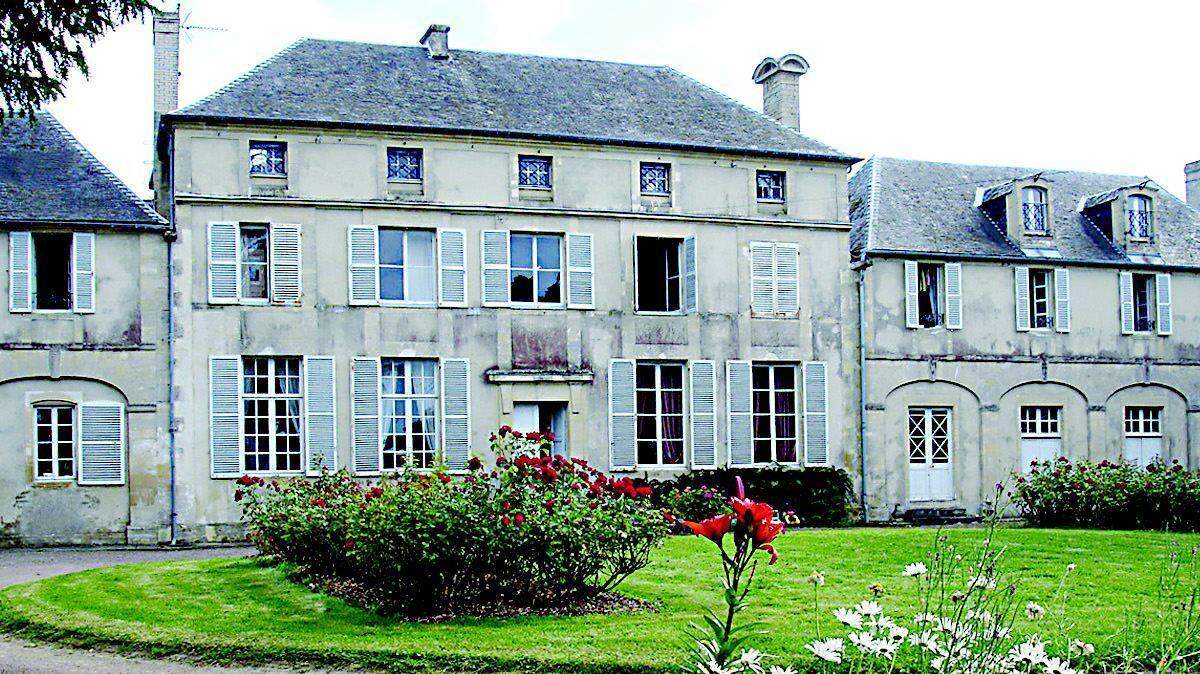 Chateau Rouge, built in the 17th century, has 10 bedrooms, two spiral staircases and a pink living room. It was renovated in the 1970s by a Paris family. It has a large back garden with apple trees, rose bushes, raspberries and black and red currants.