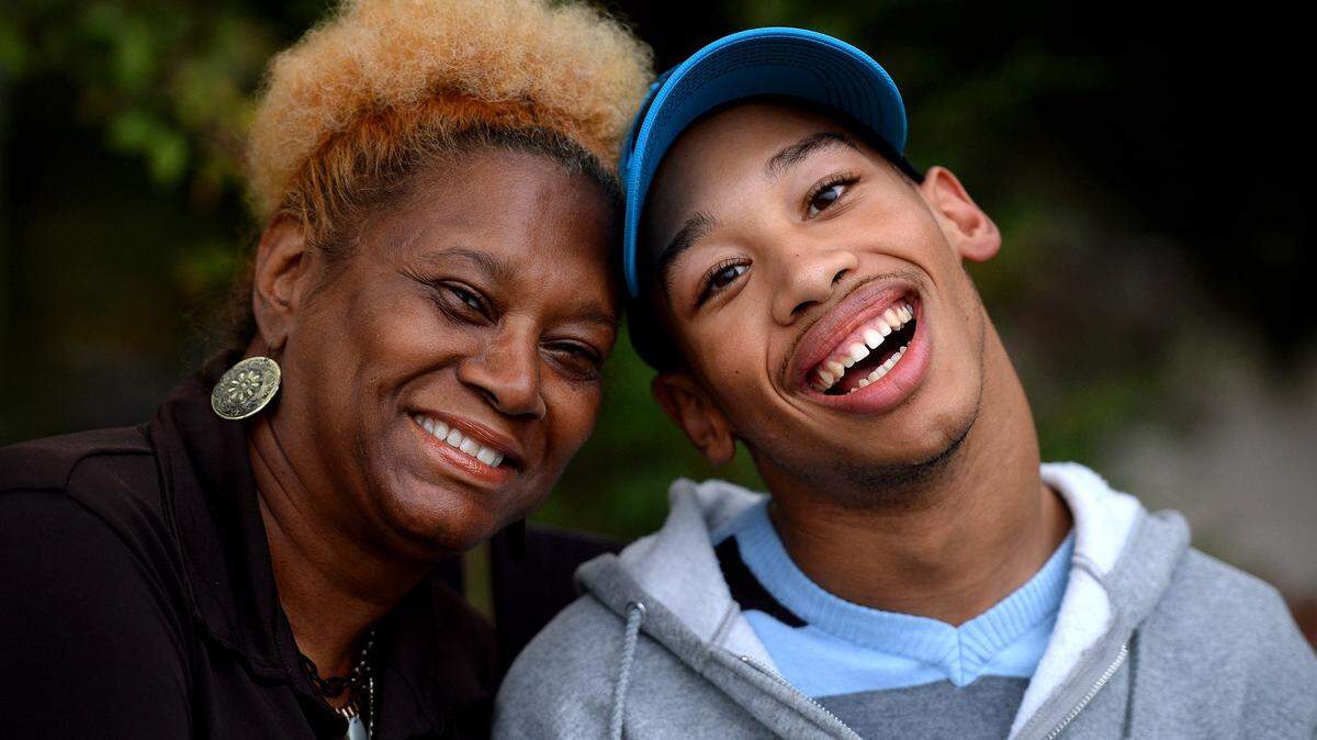 Saundra Adams, left, and grandson Chancellor Lee Adams, right, pictured in 2015. Adams and Chancellor will be guest speakers at #See Orange,  a rally to fight against domestic violence, July 28 in Lancaster. Chancellor is the son of former Carolina Panthers wide receiver Rae Carruth and the late Cherica Adams.