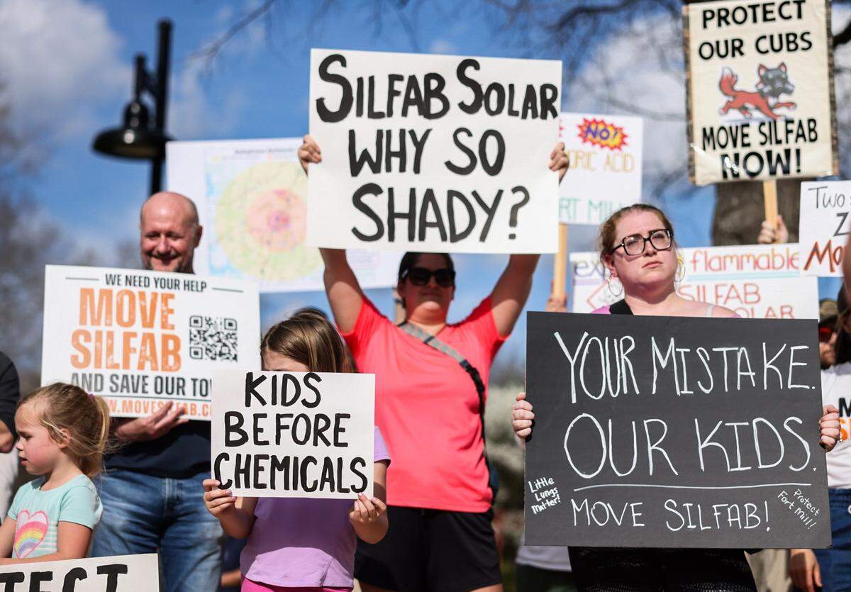 People gather at Walter Elisha Park in Fort Mill to protest Silfab Solar on Friday afternoon.