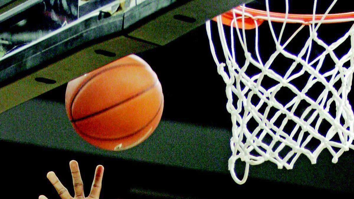 South Carolina forward Dominique Archie goes for a layup as Winthrop forward Mantoris Robinson defends during the first half Sunday in Columbia.