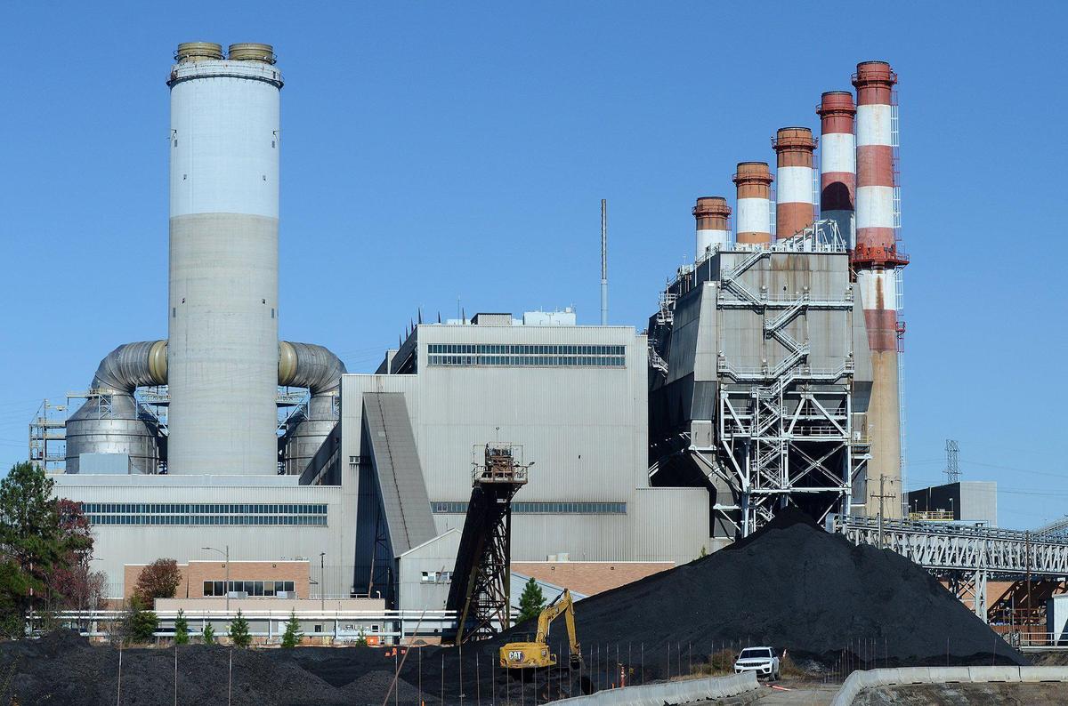 Coal is gathered before moving at the coal removal project immediately next to the Allen Steam Station. Open since 1957 the G. G. Allen Steam Station, a 1.140 GW coal-fired electricity generating facility in Belmont on Lake Wylie, is being decommissioned.