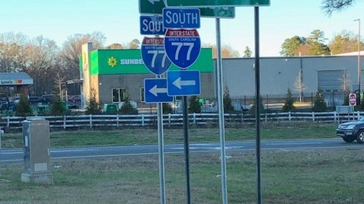 Road signs on Interstate 77 in York County, including exits for Gold Hill Road near Fort Mill and Sutton Road in Rock Hill, are being replaced.