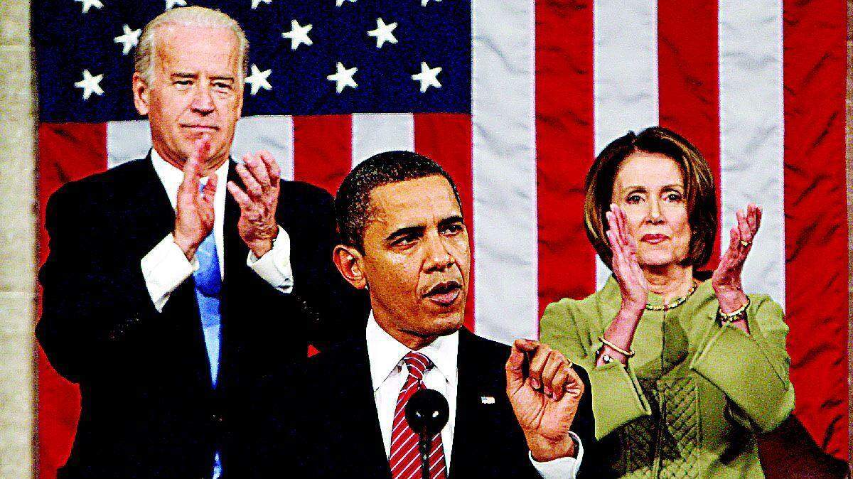 Vice President Joe Biden and House Speaker Nancy Pelosi of California applaud as President Barack Obama addresses a joint session of Congress in the House Chamber of the Capitol in Washington on Tuesday.