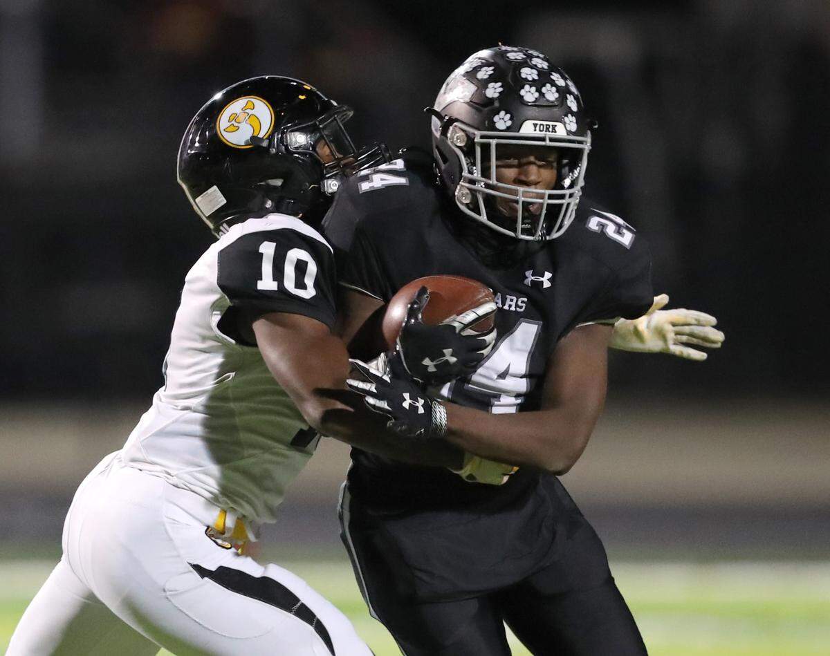 York Comprehensive High School hosted Irmo in the first round of the state playoffs November 5, 2021. York’s Javarus Guthrie is taken down by Irmo’s Caleb Currence. Andy Burriss-Special to The Herald