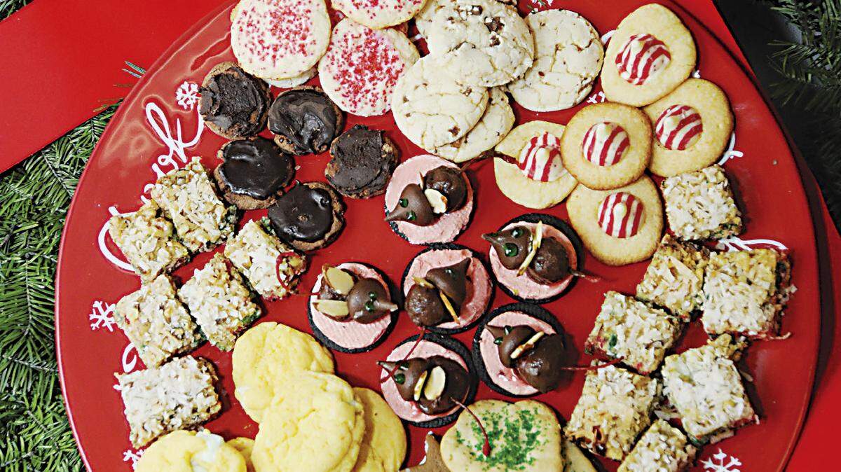 2008 HERALD FILE-Jim Stratakos __The Ladies at Woodland United Methodist Church created a sampling of what will be offered during the annual cookie sale.