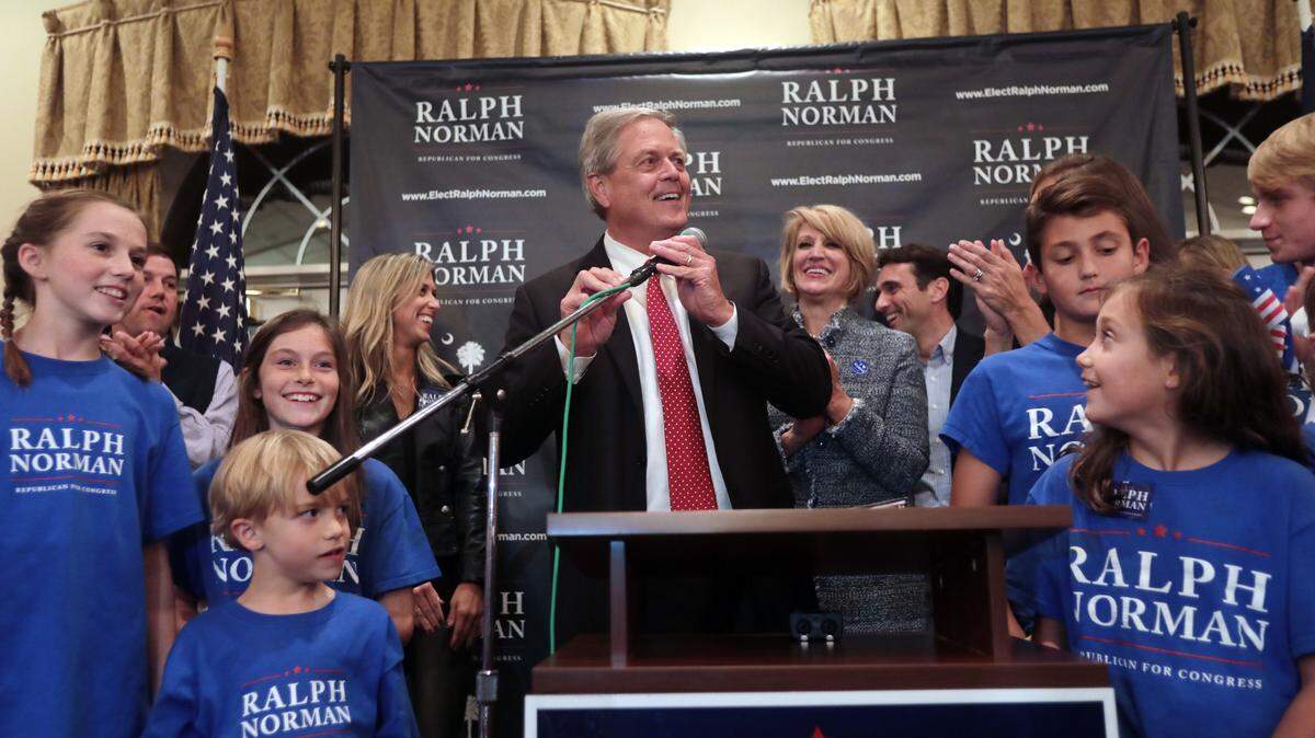 Ralph Norman talks to a large crowd surrounded by his family Tuesday in Rock Hill after defeating Archie Parnell.