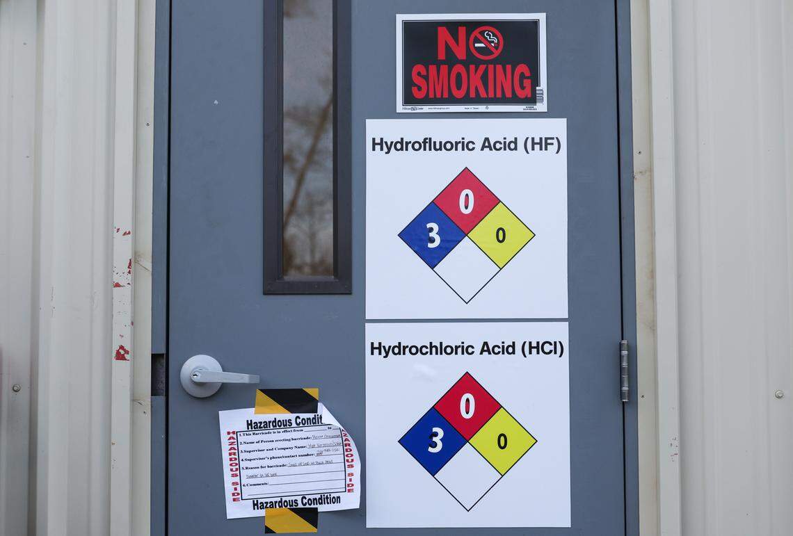 A “hazardous condition” sign is displayed on the door leading to the room where the hydroflouric acid (HF) drip occurred at Silfab Solar on Friday, March 6, 2026.